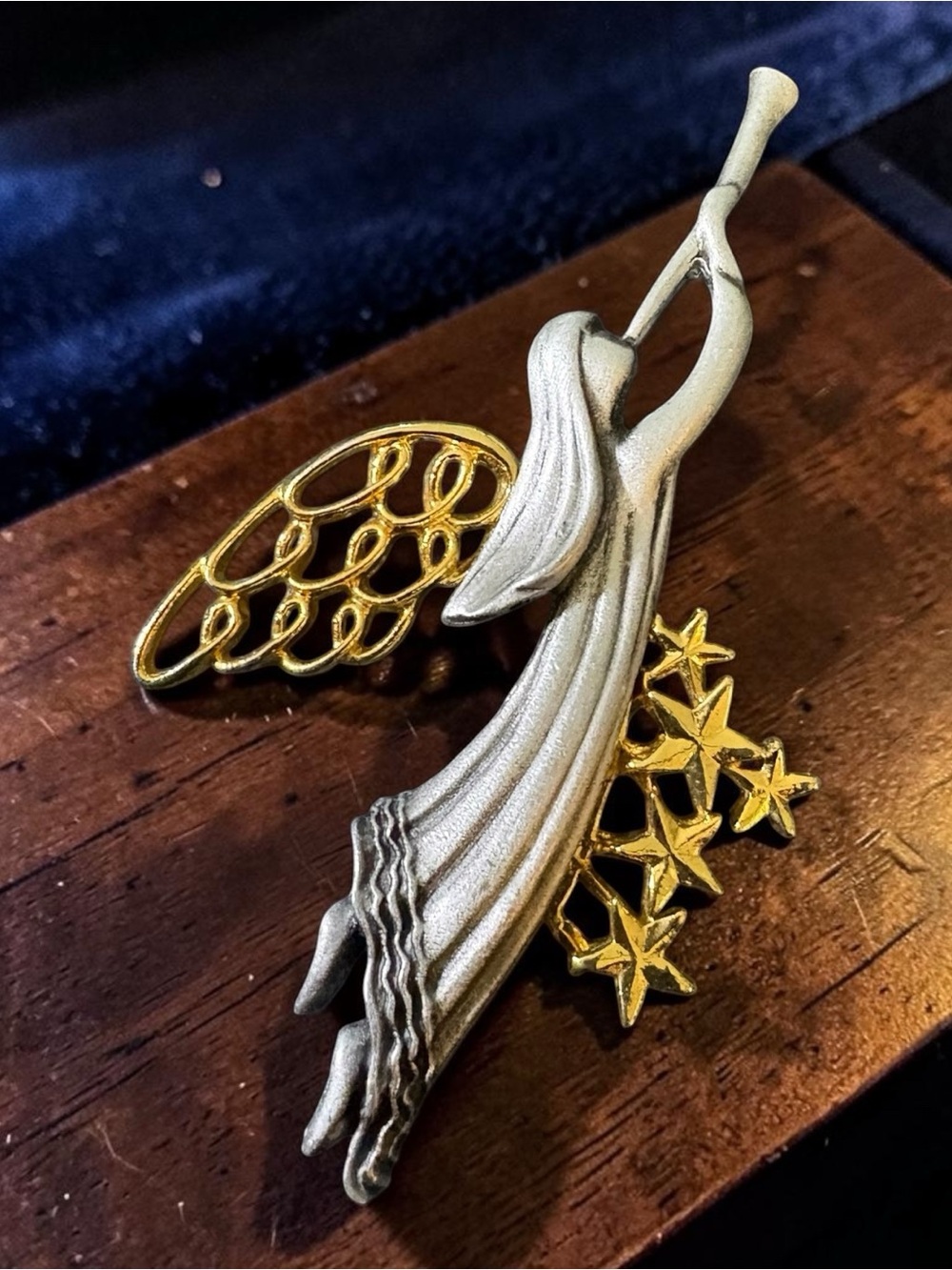 Vintage pewter and gold-tone trumpeting angel brooch